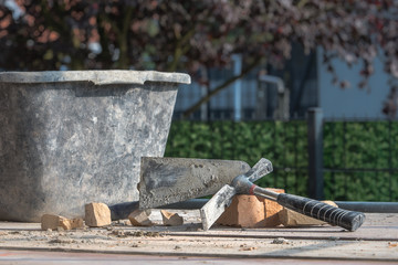 Transport and stacking of bricks, Preparation of the workplace on the construction site Mixing of...