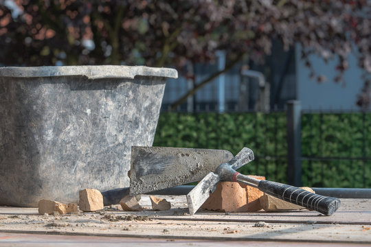 Transport and stacking of bricks, Preparation of the workplace on the construction site Mixing of mortar clinker bricklayer