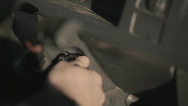 Man Placing Key Engine Lock Button