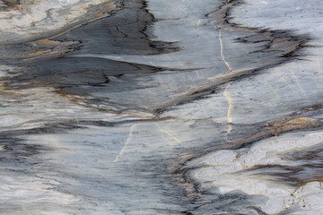 Close up of warm colored natural marble panel texture.