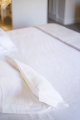 Fototapeta na wymiar Luxury hotel bedroom bed