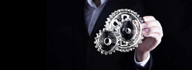 man drawing gears in screen