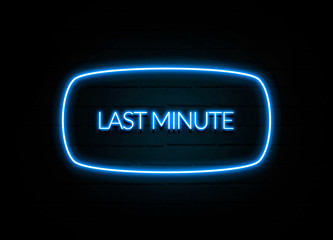 Last Minute  - colorful Neon Sign on brickwall