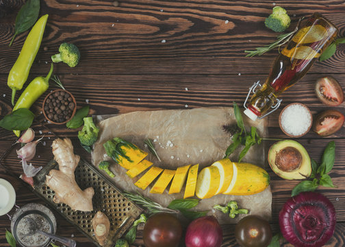 Top view of organic natural fresh vegetables on wooden background with copy space