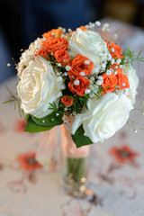 Close-up view of beautiful bouquet of roses and succulents