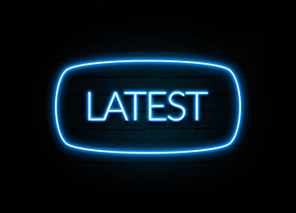 Latest  - colorful Neon Sign on brickwall