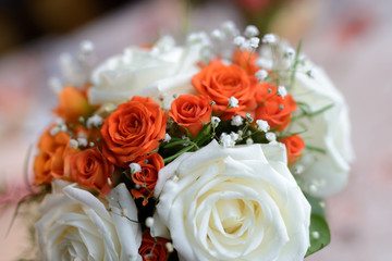 Close-up view of beautiful bouquet of roses and succulents
