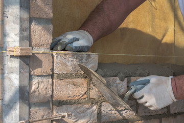 Transport and stacking of bricks, Preparation of the workplace on the construction site Mixing of mortar clinker bricklayer