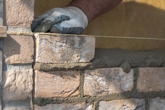Transport and stacking of bricks, Preparation of the workplace on the construction site Mixing of mortar clinker bricklayer