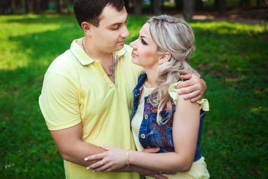 cute couple resting in city park