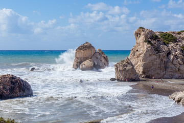 Fototapeta na wymiar Aphrodite's Rock near Paphos in Cyprus on a stormy day.