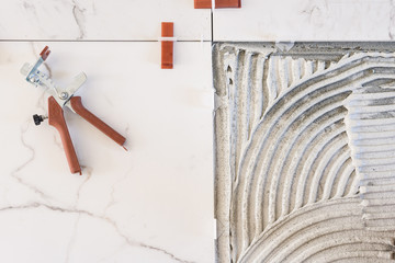 overhead view of tile glue and tiles