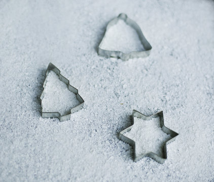 Christmas Cookie cutters covered with snow