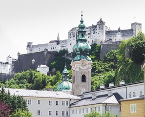 Fototapeta na wymiar View of St. Peter's Abbey and Hohensalzburg Castle in Salzburg, Austria