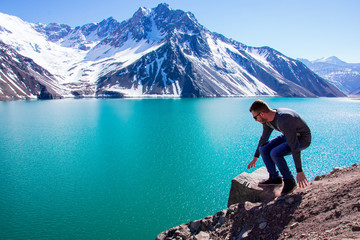Time to relax sitting on the ground an looking at the beauty of the Embalse El Yeso in Chile