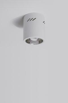 Energy Saving Lightbulb on White Ceiling