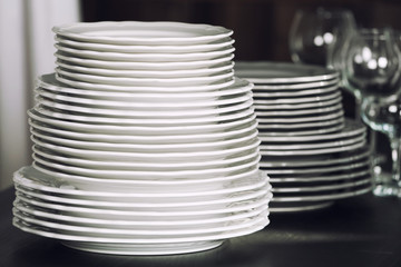 Stack of plates on table