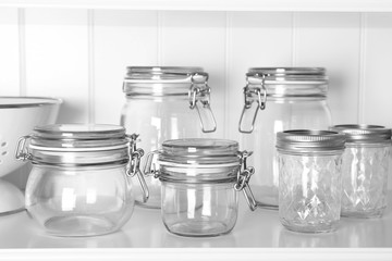Glass jars on shelf