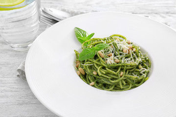 Pasta with basil pesto sauce in plate