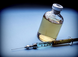  Several Vials And Syringe In Laboratory, Conceptual Image 