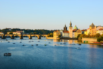 Cityscape of Prague old town, its towers, Vltava river, Charles bridge, St. Francis of Assisi church. One of the most famous areas of Czech Republic capital