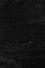 Dark grey black slate background or texture.
