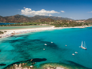 Fototapeta na wymiar Transparent and turquoise sea in Porto Giunco, Sardinia, Italy