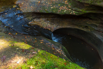 Little River with Mossy Rocks and Blue Water