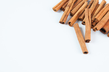 cinnamon sticks on a white background