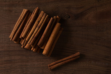 cinnamon sticks on a wooden background