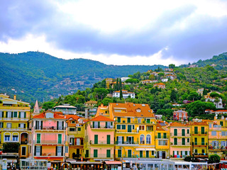 Fototapeta na wymiar Beautiful view of town of Alassio with colorful buildings, Liguria, Italian Riviera, region San Remo, Cote d'Azur, Italy