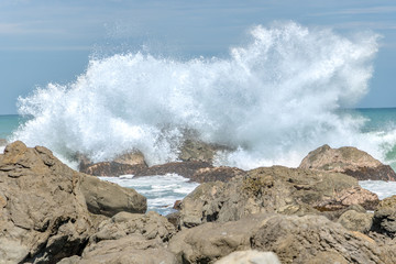 Huge Waves Crashing On Rocks