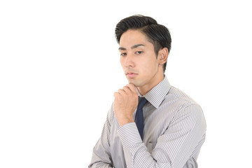 悩むビジネスマン