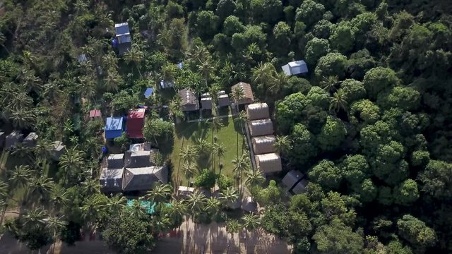 Looking down onto and then backing up to reveal Koh Tonsay, Rabbit Island, Cambodia, a quintessential backpacker paradise.