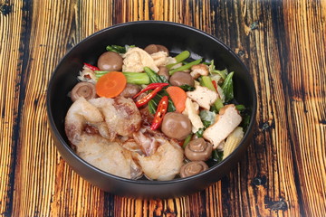 Fried big noodle topped mixed vegetables for organic food.