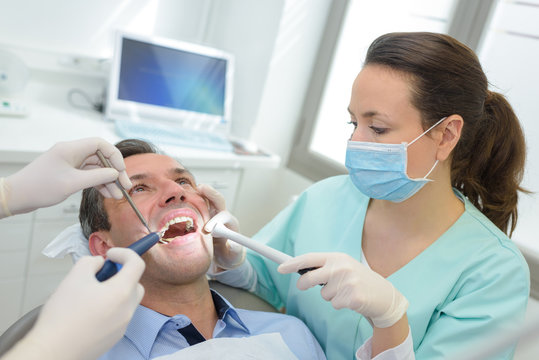 Man having dental treatment