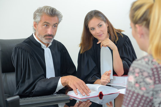 Client with legal professionals