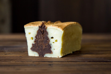 Surprise vanilla cake with a chocolate tree inside. holidays concept