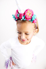 Young girl dressed up as a Unicorn for Halloween