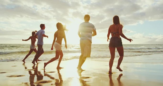 Friends on the Beach at Sunset