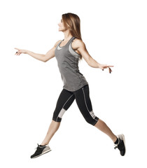 Obraz premium Fitness girl posing on white background isolated