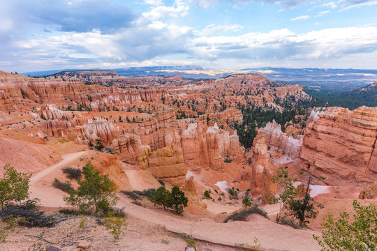 Spectacular view at the cliffs and cloud sky. Amazing mountain landscape. Breathtaking view of the canyon. Bryce Canyon National Park. Utah. USA