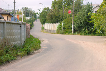 Bad asphalt road at rural