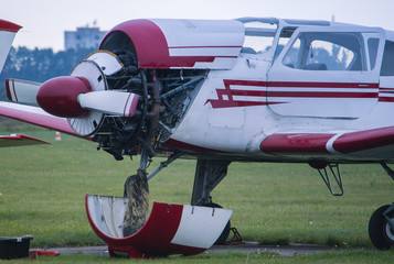 Small plane with opened turbine for repairing