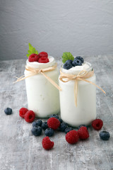 Fresh Yogurt. Breakfast with yogurt and blueberries and raspberrries