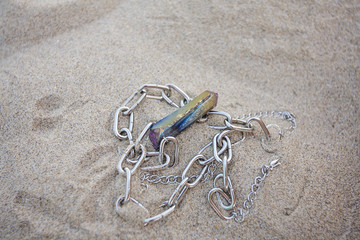 Fototapeta na wymiar Necklace in the sand