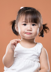 Baby girl eating snack