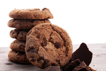 Chocolate cookies on wooden table. Chocolate chip cookies shot.