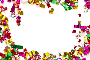 close up of confetti on white background