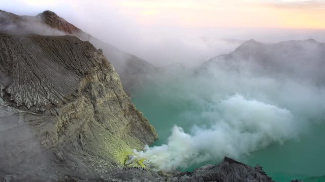 Lake and Sulfur Mine at Khawa Ijen Volcano Crater, Java Island, Indonesia